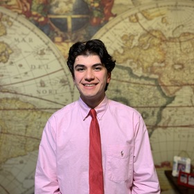 Aleksander Kudratov’s headshot.