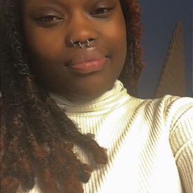 Dominique Willis’ headshot.