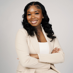 Annmarie Aris’ headshot.