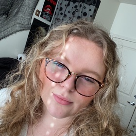 Indigo Hall’s headshot.