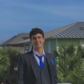 Ethan Correa’s headshot.