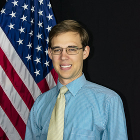 Andrew McCooey’s headshot.