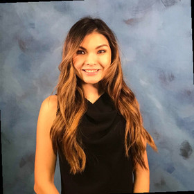 Asel Elliott’s headshot.