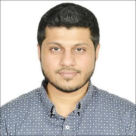 Muhammad Hassan’s headshot.