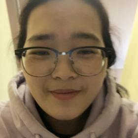 Yifei Wang’s headshot.