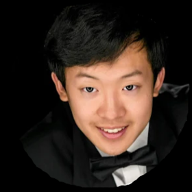 Max Tang’s headshot.