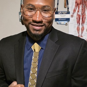 Aquil Holden’s headshot.
