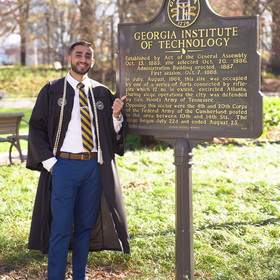 Adil Momin’s headshot.