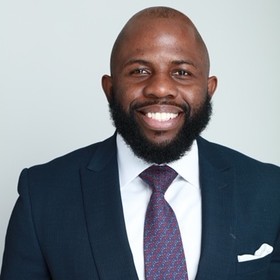 Elton Moyo’s headshot.