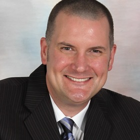 Derek Megyesi’s headshot.