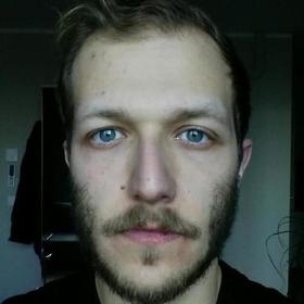 Evangelos Daravigkas’ headshot.