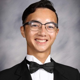 Andrew Abrigo’s headshot.