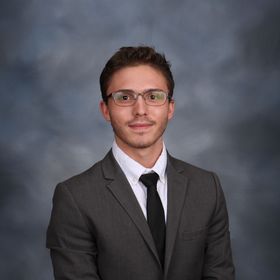 Adam Rosen’s headshot.