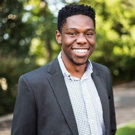 Travis Onyima’s headshot.