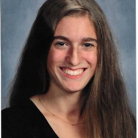 Lora Acquario’s headshot.