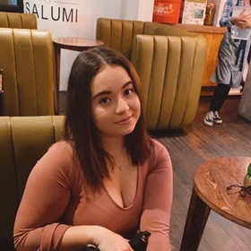 Melannie Rodriguez A’s headshot.