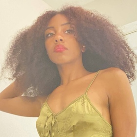 Noel Gilkes’ headshot.