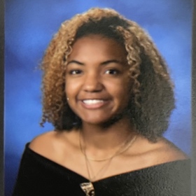 Riley Dixon’s headshot.