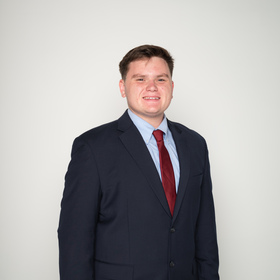 Hayden Holcomb’s headshot.