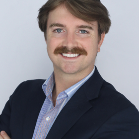 Matthew Kelly’s headshot.