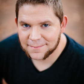 Sam Owens’ headshot.