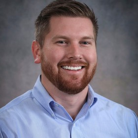 Justin Hey’s headshot.