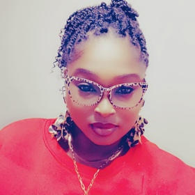 Takia Blue’s headshot.