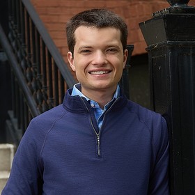 Matthew Tate’s headshot.