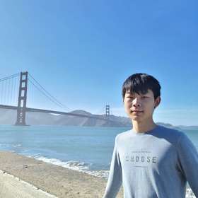 Yukun Song’s headshot.