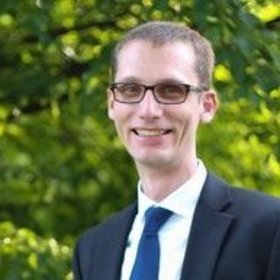 Mike Repede’s headshot.