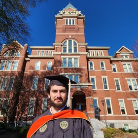 Nurlan Amirov’s headshot.