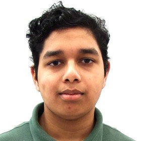 Vedang Dicholkar’s headshot.