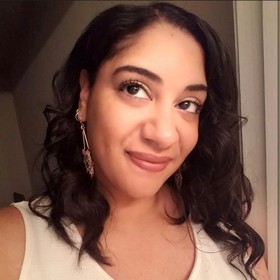 Kimberly Adams’ headshot.