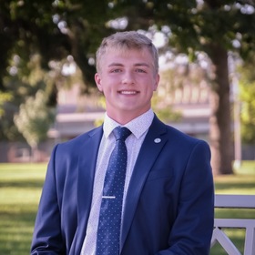 Mason Pulse’s headshot.