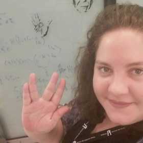 Camila Gasparin’s headshot.