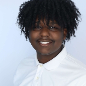 Corey Richards-Persad’s headshot.