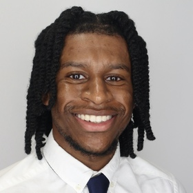 Nicholas Wilson’s headshot.