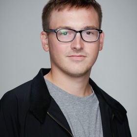 Kyle Duggan’s headshot.