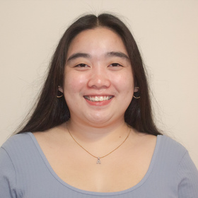 Kisha Abella’s headshot.