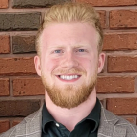 Colin Henry’s headshot.