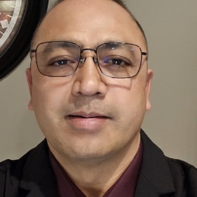 Ben Chhetri’s headshot.