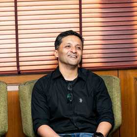 Kashif Kudalkar’s headshot.