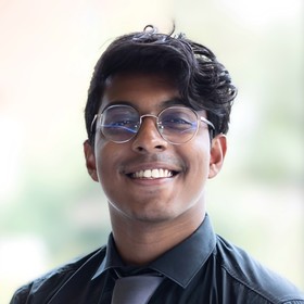 Sasi Nandakumar’s headshot.