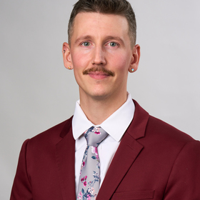 Matthew Frizzell’s headshot.