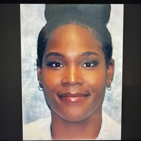 Ashley Almond’s headshot.