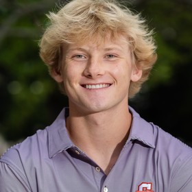 Jacob Muir’s headshot.