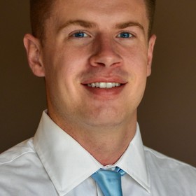 Logan Adam’s headshot.