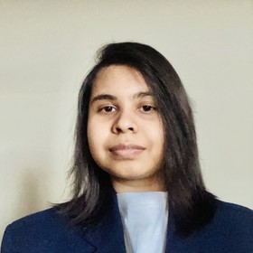 Tanisha Karim’s headshot.