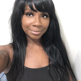 Juneria Day’s headshot.