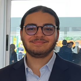 Rayane Abirou’s headshot.